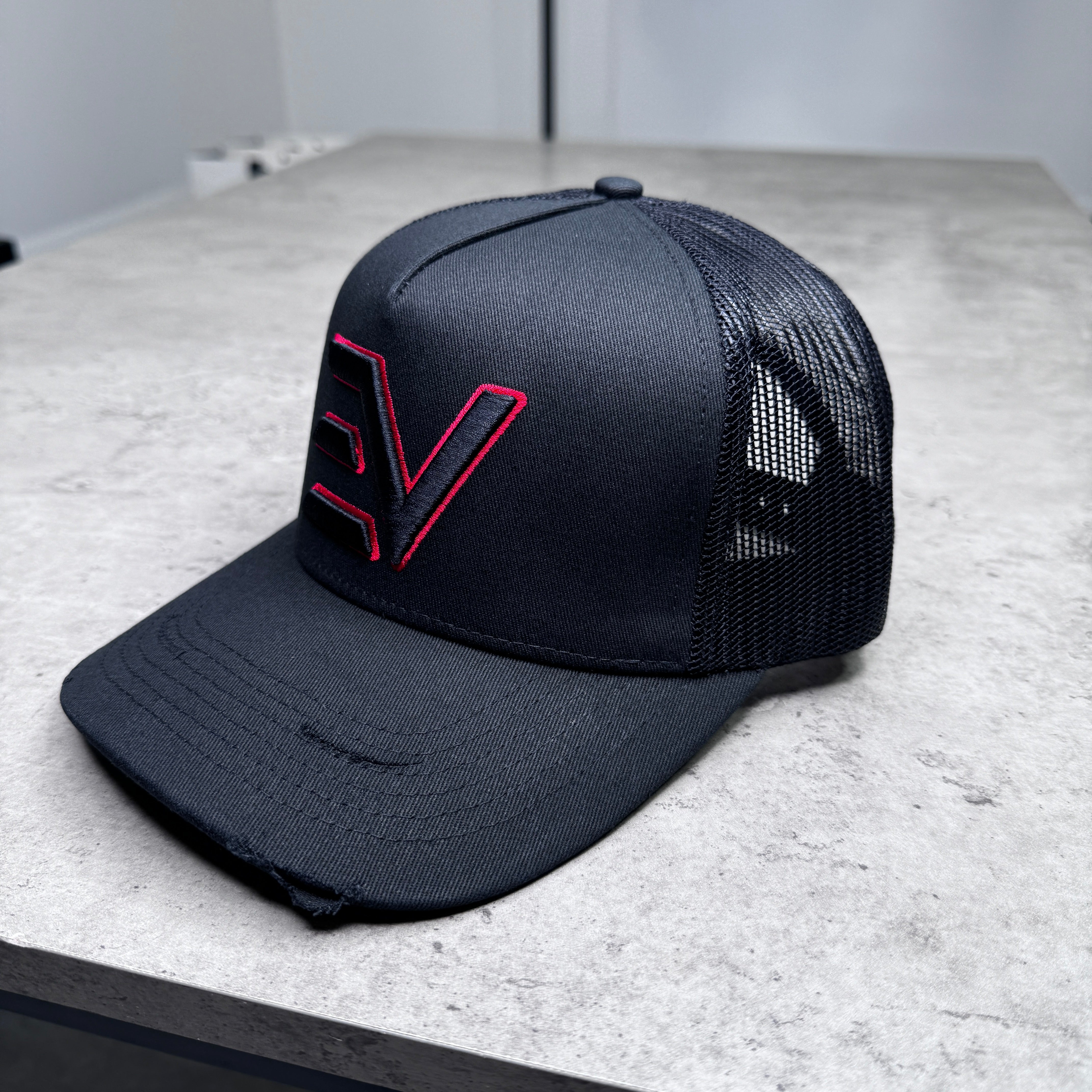 EV Logo Trucker Cap “Black/Red”