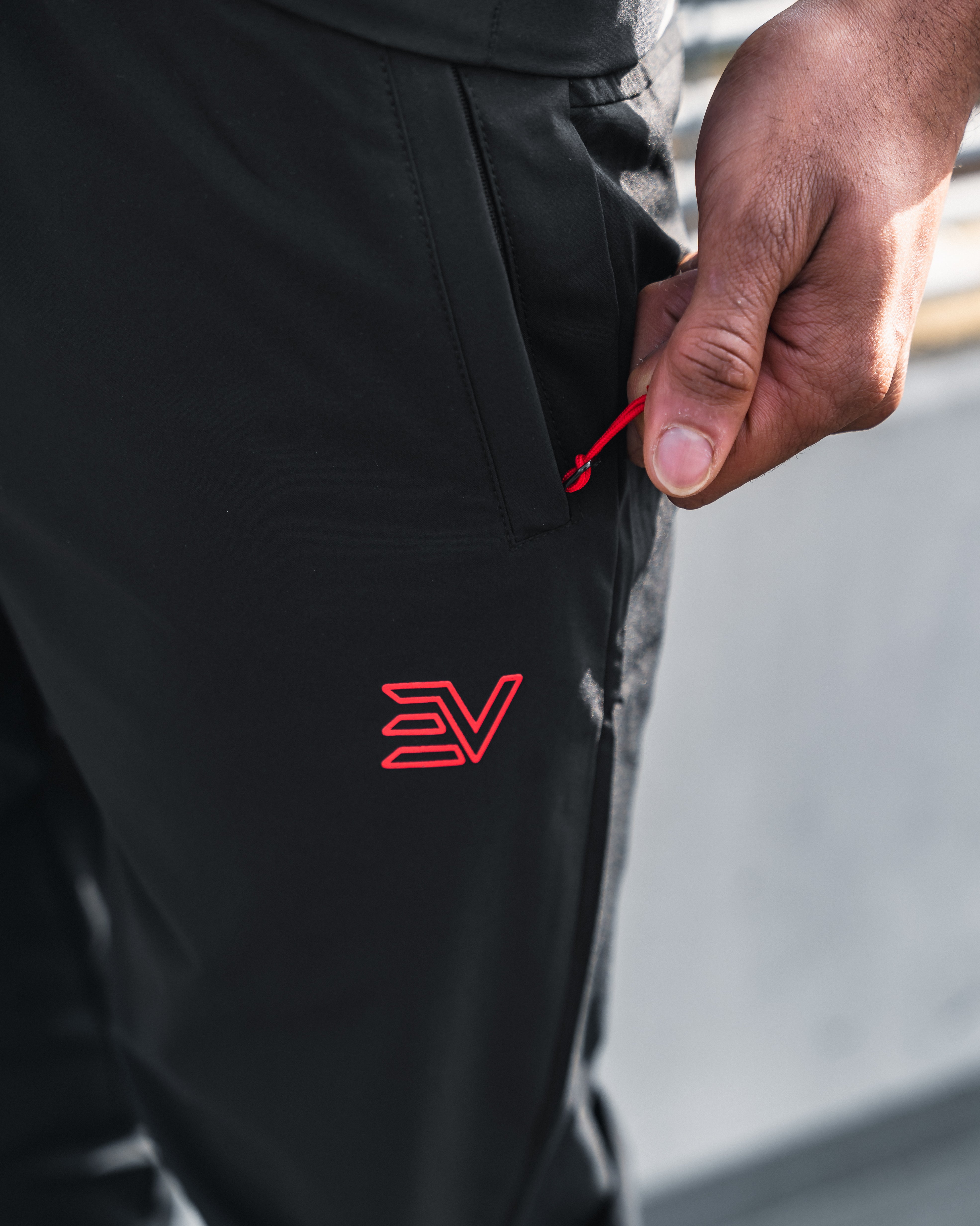 EV TECHNICAL TRACK PANTS  “Black/Red”